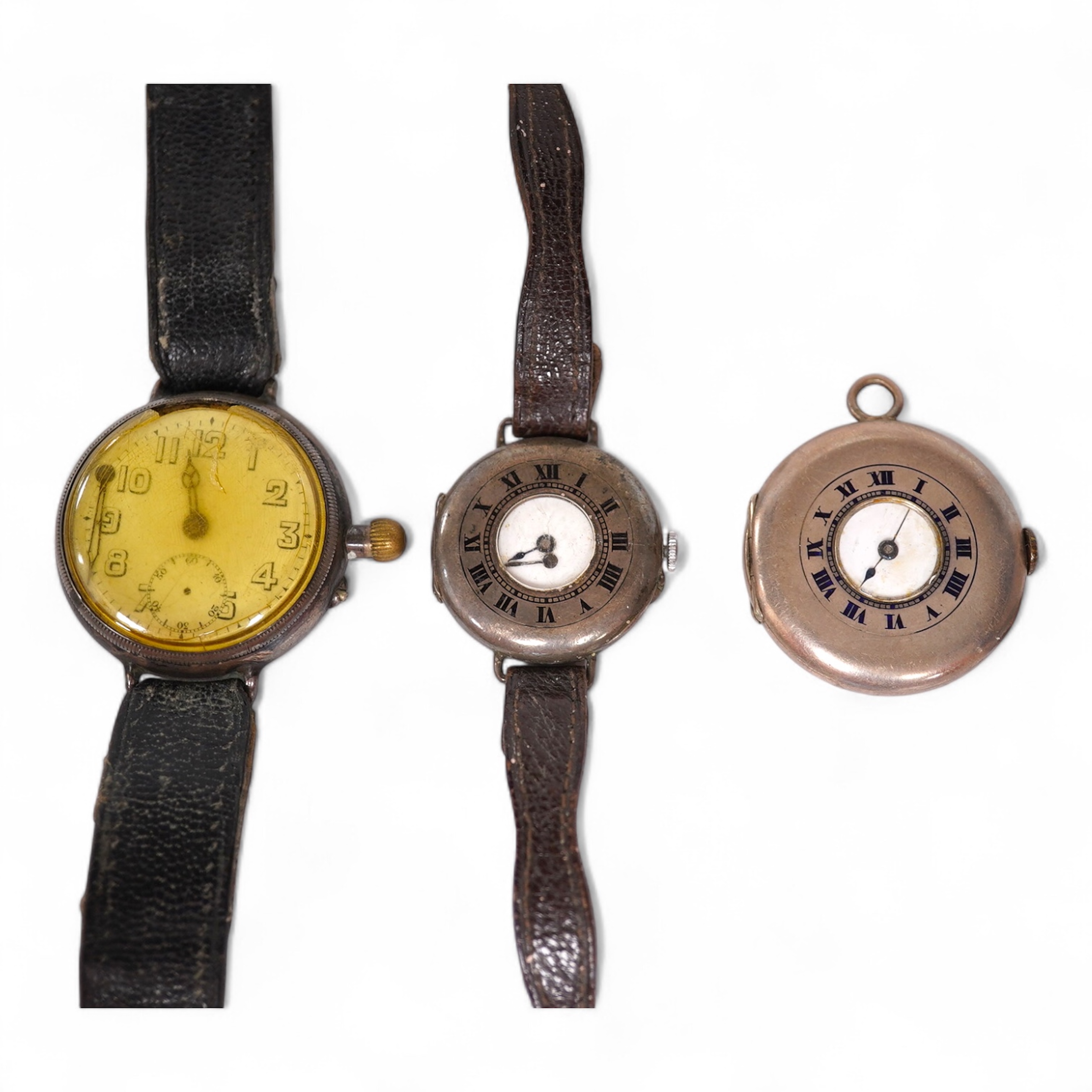 An early 20th century silver Borgel cased manual wind wrist watch(a.f.), one other similar silver half hunter manual wind wrist watch(no strap) and one other similar with a strap. Condition - poor